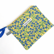 Handmade yellow zipper pouch with blue floral print, Montreal artisan Willow Branch / Pochette zippée jaune à fleurs bleues faite main, artisane montréalaise Willow Branch