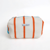 Rectangular pouch with orange stripes and 'Willow Branch' label on a white background