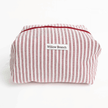 Red and white striped pouch with 'Willow Branch' label on a white background