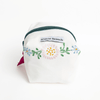 Small pouch with floral embroidery and 'Willow Branch' label on a white background