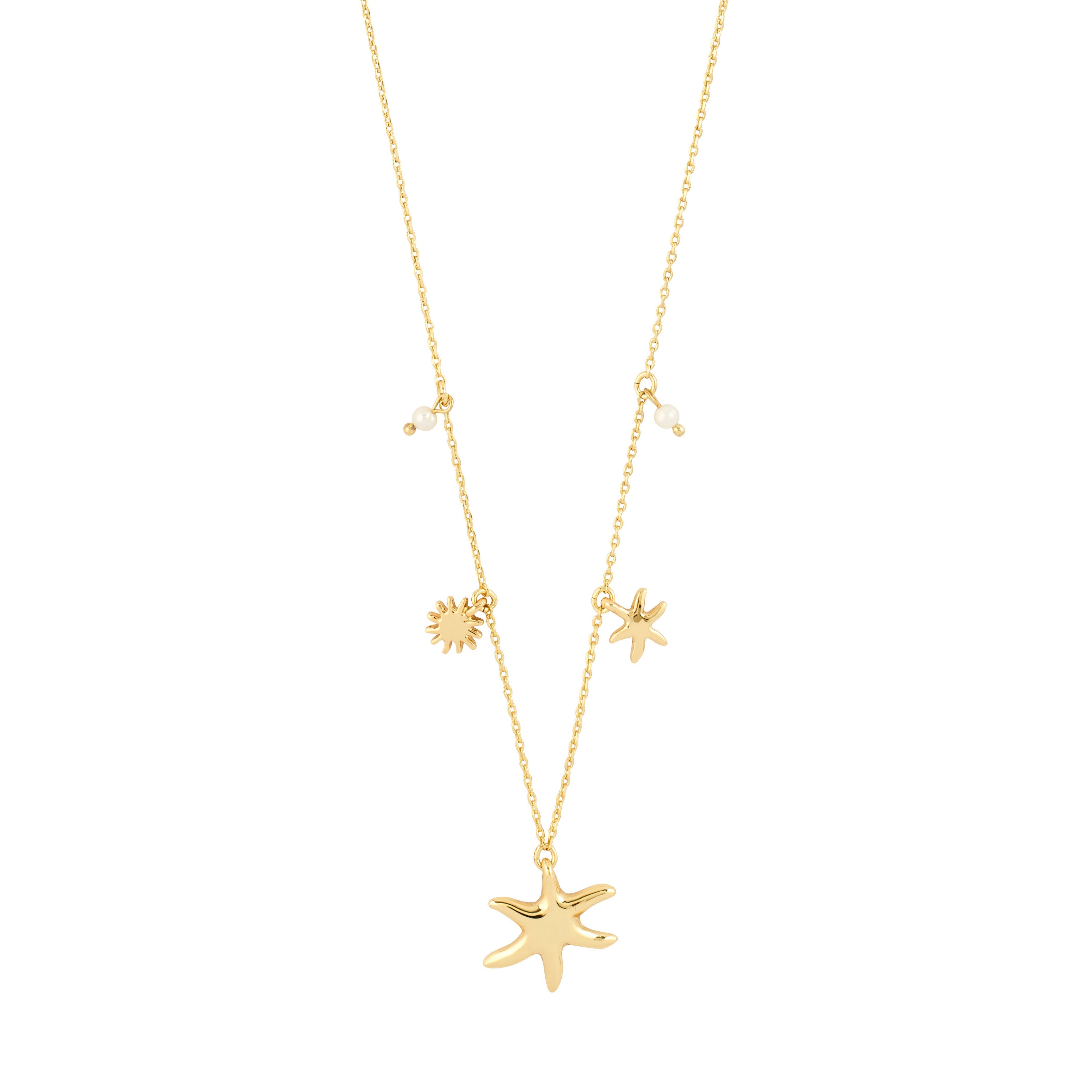 Gold plated cable chain necklace with large starfish pendant, small starfish charm, sun charm, and two freshwater pearl accents on white background. Gold plated cable chain necklace with large starfish pendant, small starfish charm, sun charm, and two freshwater pearl accents on white background
