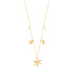 Gold plated cable chain necklace with large starfish pendant, small starfish charm, sun charm, and two freshwater pearl accents on white background. Gold plated cable chain necklace with large starfish pendant, small starfish charm, sun charm, and two freshwater pearl accents on white background