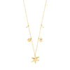 Gold plated cable chain necklace with large starfish pendant, small starfish charm, sun charm, and two freshwater pearl accents on white background. Gold plated cable chain necklace with large starfish pendant, small starfish charm, sun charm, and two freshwater pearl accents on white background