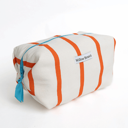 Handmade white boxy zipper pouch with bold orange stripes and turquoise zipper, Montreal artisan Willow Branch / Pochette boxy blanche zippée à rayures orange et fermeture éclair turquoise, artisane montréalaise Willow Branch