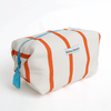 Handmade white boxy zipper pouch with bold orange stripes and turquoise zipper, Montreal artisan Willow Branch / Pochette boxy blanche zippée à rayures orange et fermeture éclair turquoise, artisane montréalaise Willow Branch