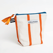 Handmade white triangle zipper pouch with orange stripes and turquoise zipper, Montreal artisan Willow Branch / Pochette triangle blanche zippée à rayures orange et fermeture éclair turquoise, artisane montréalaise Willow Branch