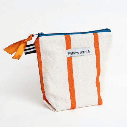 Handmade white triangle zipper pouch with orange stripes and turquoise zipper, Montreal artisan Willow Branch / Pochette triangle blanche zippée à rayures orange et fermeture éclair turquoise, artisane montréalaise Willow Branch